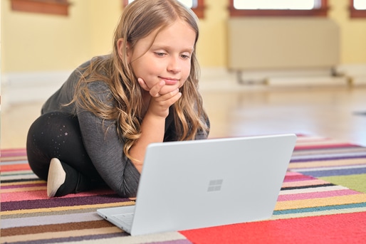 Student using a Microsoft Surface Laptop SE instead of a Chromebook